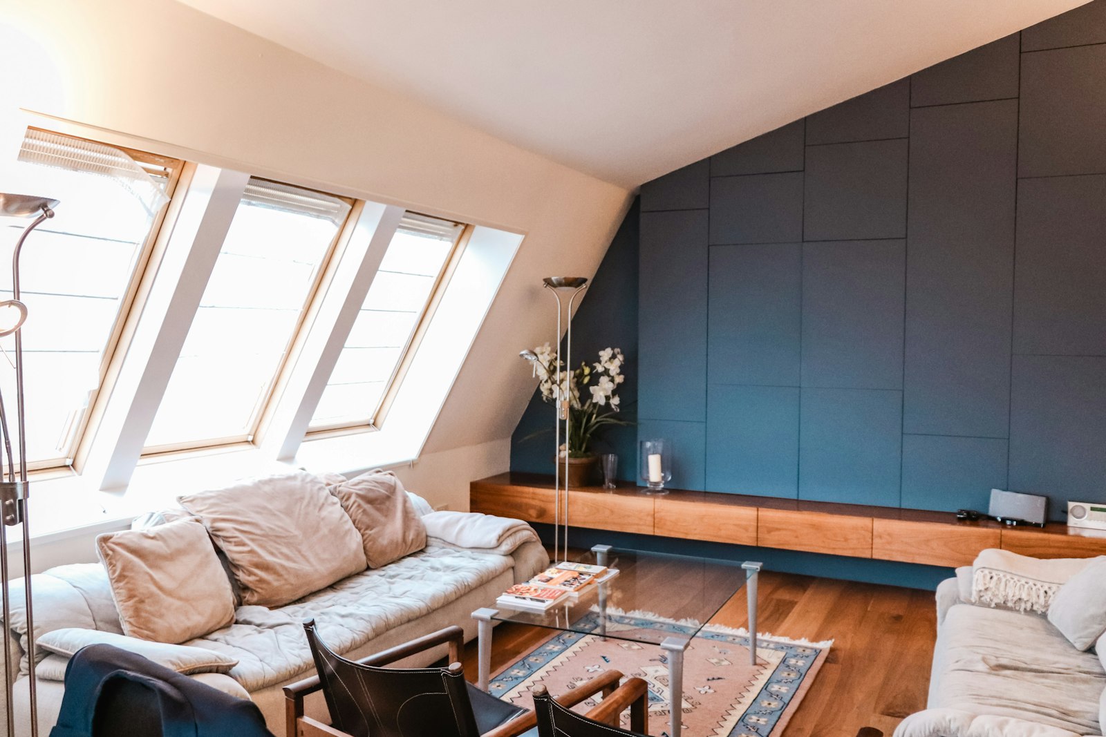Loft conversion living room with roof windows