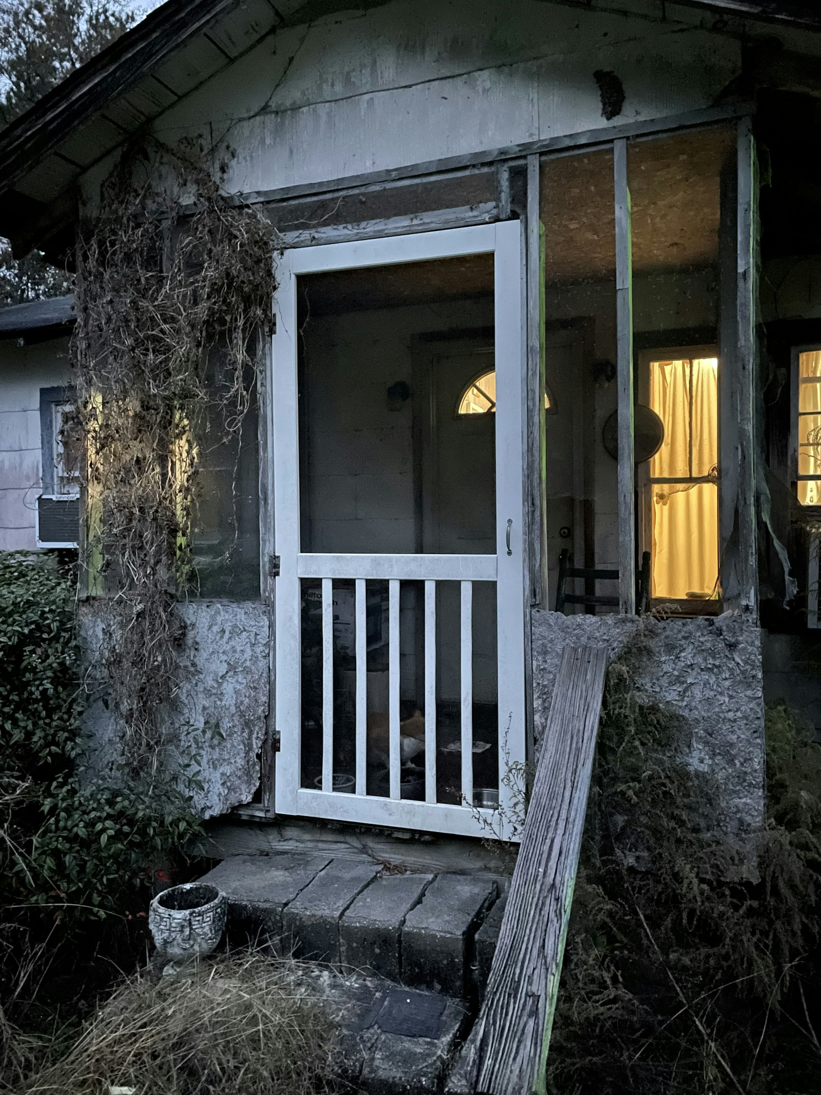 Front porch with glazed door on a brick house